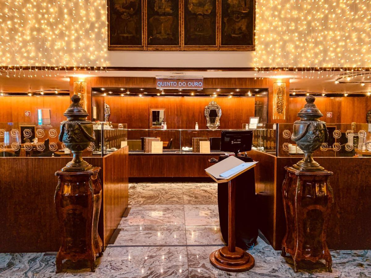 Ouro Minas Hotel Belo Horizonte, Dolce By Wyndham Exterior foto The reception desk at the hotel
