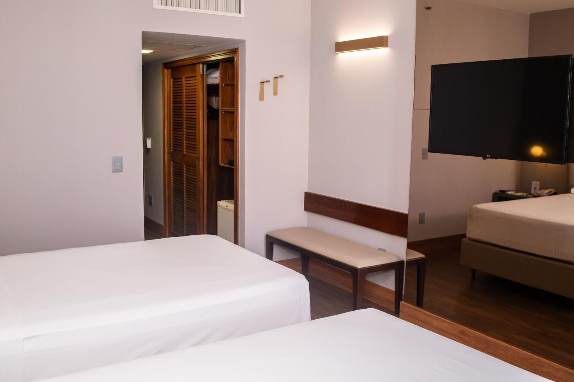 Ouro Minas Hotel Belo Horizonte, Dolce By Wyndham Exterior foto A room at the hotel
